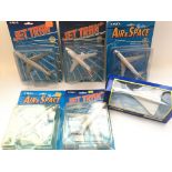 A collection ERTL Die Cast planes including a 737,