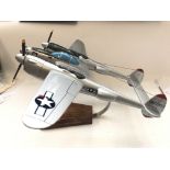 A Resin model of a Lockheed P-38 Lighting on stand