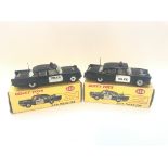 Two boxed Dinky U.S.A. police cars, one box is a r
