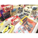 A Collection of boxed die cast cars including Mode