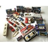 A collection boxed and loose die cast vehicles, mo