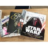 A collection of Star Wars, Bond and Elvis books et