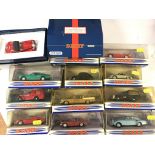 A collection of boxed Dinky cars.