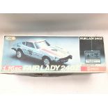 A Nikko 1/16 scale Fair Lady 240Z R/C Car boxed.