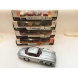 A collection of New-Way car packs Scale 1.43 and a