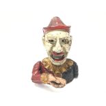 A Cast Iron Clown Money Bank.