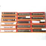 A collection of sixteen boxed Hornby OO gauge railway carriages.