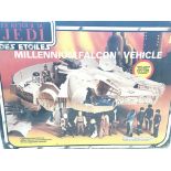 A boxed vintage Millennium Falcon and a boxed At-A