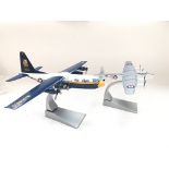 A Corgi Lockheed KC-130 Hercules #48402 and a Afro