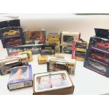 A collection of boxed Die cast vehicles including