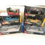 A collection of Burago boxed cars including a Jagu