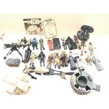 A collection of vintage Star Wars figures with som