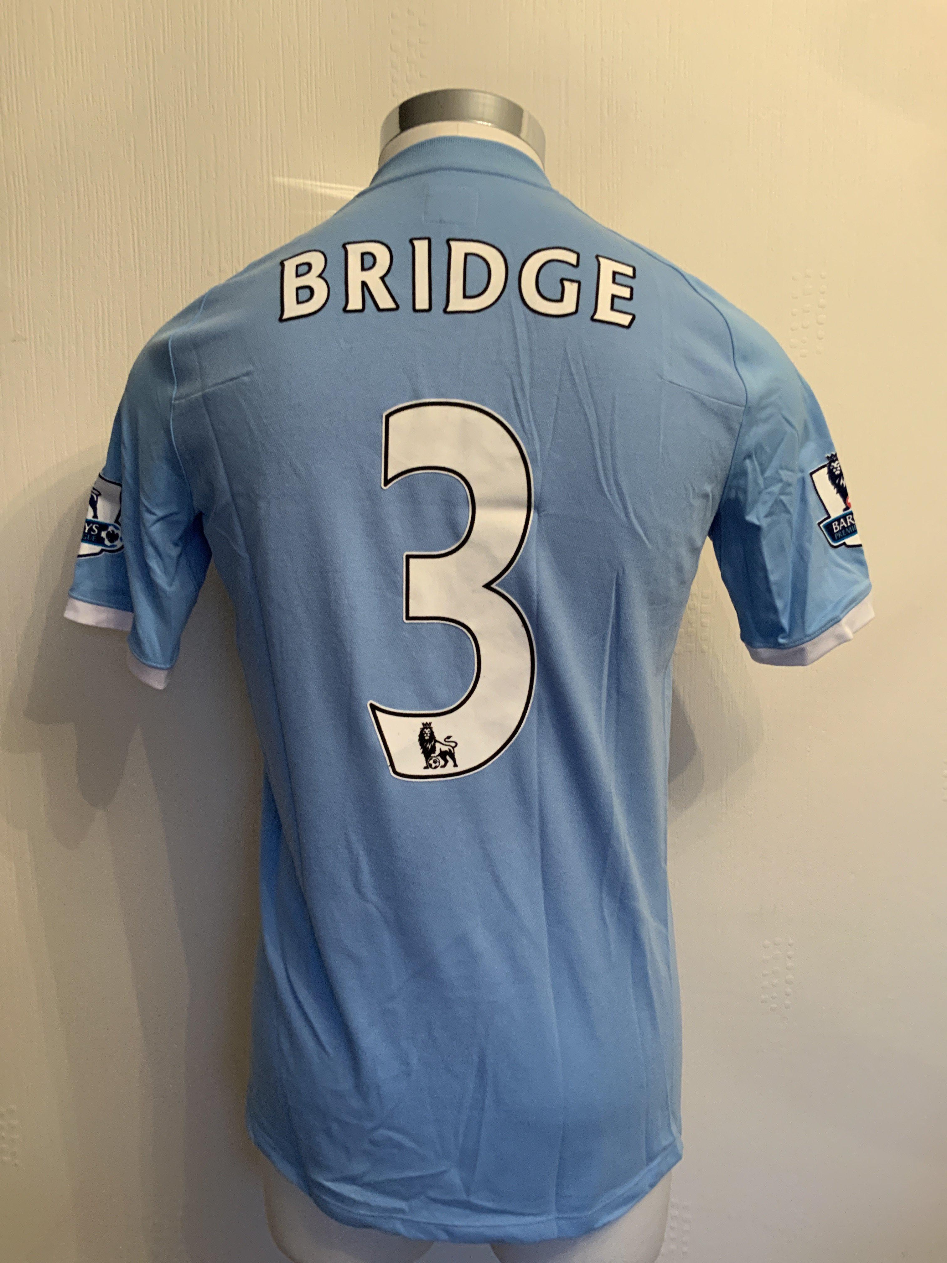 Bridge Manchester City 2010/2011 Match Worn Poppy Football Shirt: Short sleeve blue Umbro shirt - Image 2 of 3