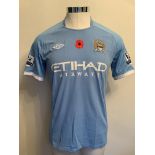 Bridge Manchester City 2010/2011 Match Worn Poppy Football Shirt: Short sleeve blue Umbro shirt