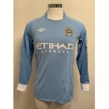 Dzeko Manchester City 2010/2011 Match Worn Football Shirt: Long sleeve blue Umbro shirt number 10.