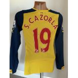 Carzorla 2014/2015 Match Worn Arsenal Away Football Shirt: Yellow long sleeve shirt worn in a