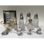 A collection of hallmarked silver mounted botttles