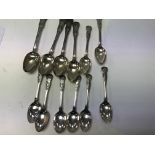 Four Georgian silver table spoons and eight Georgi