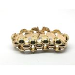 A ladies 18ct yellow and rose gold bracelet with a