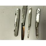 Four mother of Pearl fruit knives two with silver