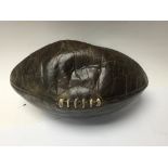 A 1930s Vintage leather rugby ball for Old Etonian