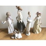 A Lladro figure together with four Nao examples. (