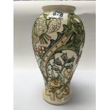 A Moorcroft Pottery Golden Lily design Vase. 26cm.