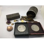A small Chinese box, various coins, pens and other