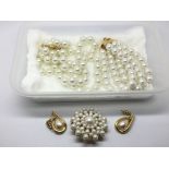 A Napier pearl set necklace, bracelet, earrings an