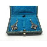 A boxed pair of flared design drop earrings set wi