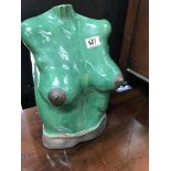 A green glazed pottery bust 43 cm