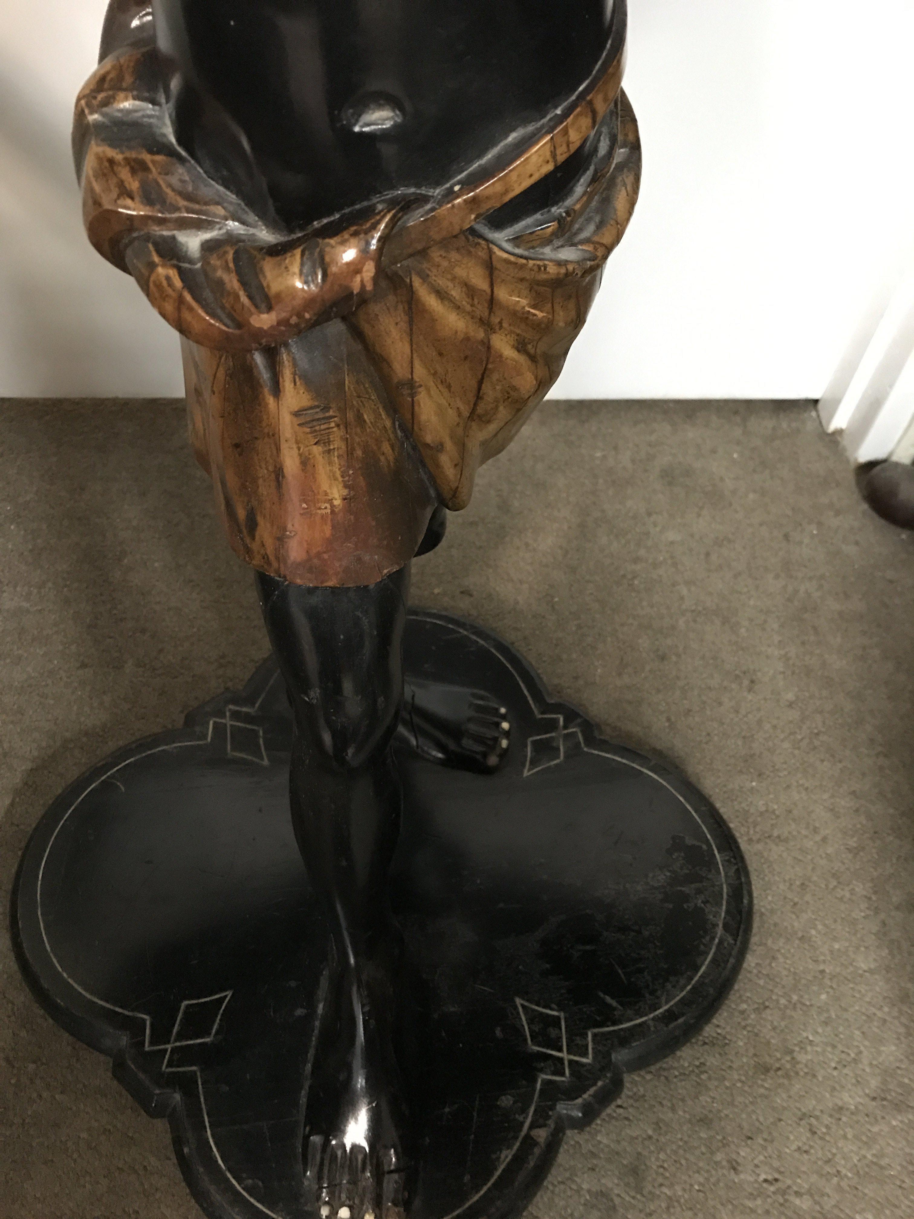 A Victorian Blackamoor occasional table The shaped - Image 3 of 5