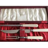 A boxed Priestley & Moore carving set.