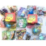 A Large collection of Burger King meal toys including land before time, Spiderman,Disney and Pokemon