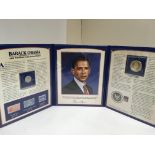 A commemorative coin presentation pack of Barak Obama