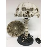 A lamp in the form of skulls and a spine (height 3