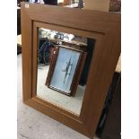 A collection of mirrors a large medium oak modern