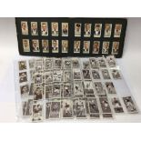 A selection of sporting related cigarette cards, i
