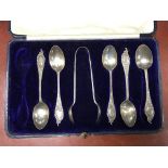 A cased set of hallmarked silver teaspoons ( 1 missing).