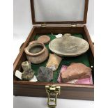 A case containing Roman pottery and fragments incl