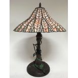 A Tiffany style lamp, base decorated With dragonfl