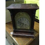 A box containing old clocks.