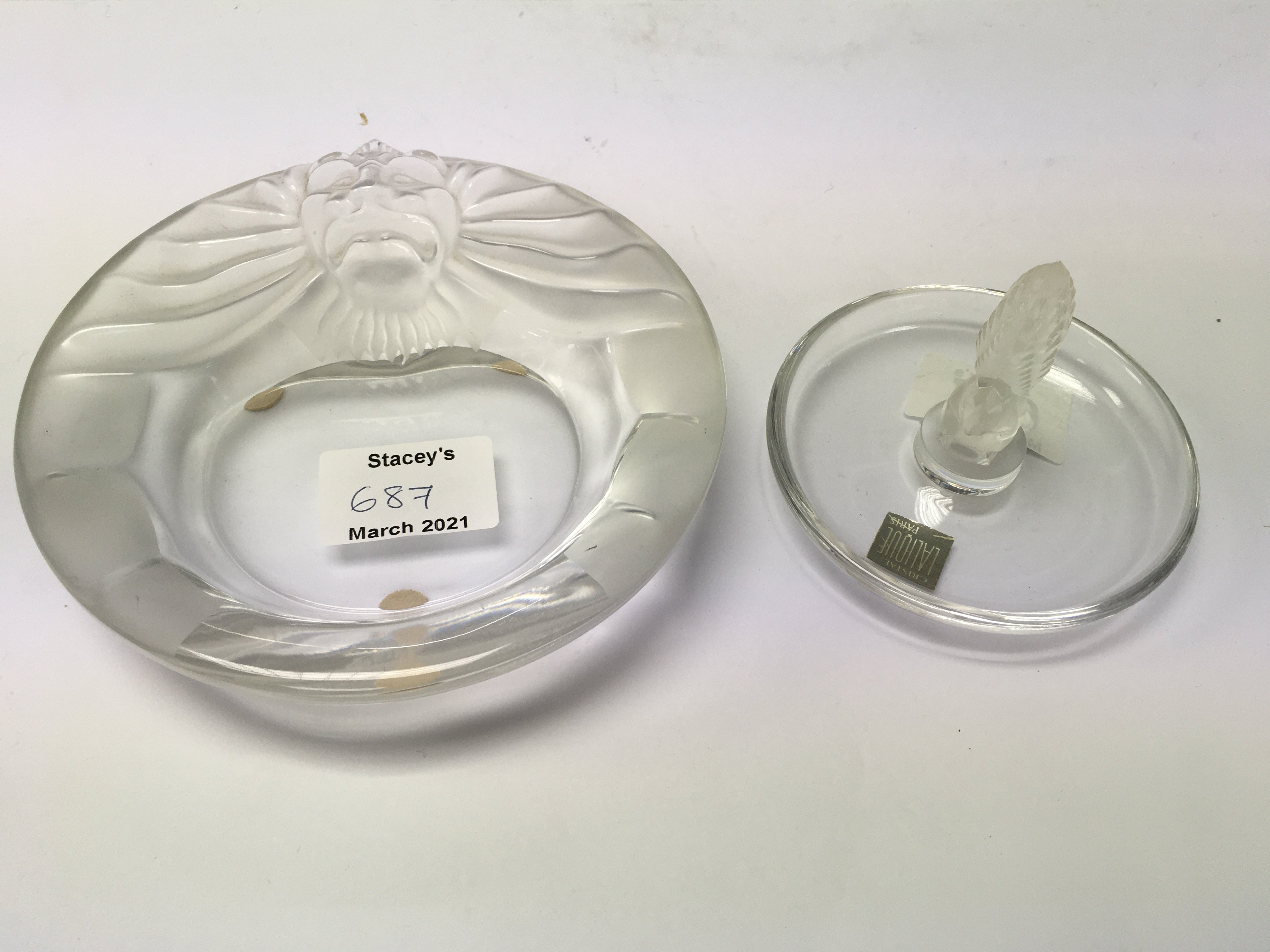 A Lalique lion ashtray and a small squirrel ring t