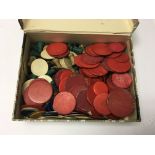 A box of mixed stained ivory and bone gaming counters.