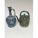A Persian style pottery kettle and a Iznik style v