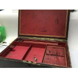 A Victorian traveling writing box with a well fitted tooled leather interior maker W&J Milne