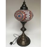 A Moorish style lamp in red geometric design. Heig