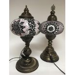 Two Moorish style lamps of geometric design, in co