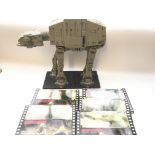 A Star Wars Limited edition At-At Walker model 2009 and a collection of Empire Strikes Back 70 mm