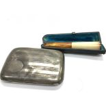 A silver cigarette box Chester hallmarks weight 56g and a cigarette holder (2)